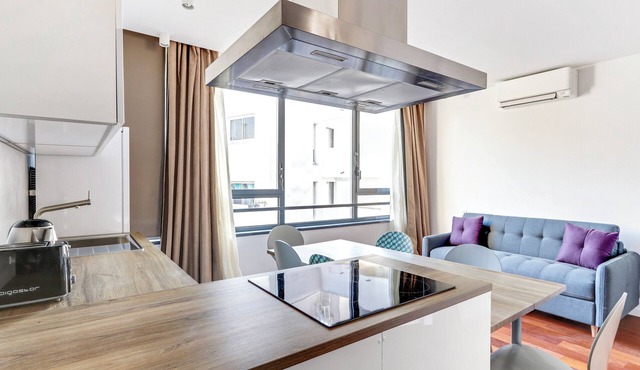 A Modern 2/3 BDR with parking at La Chapelle in Paris