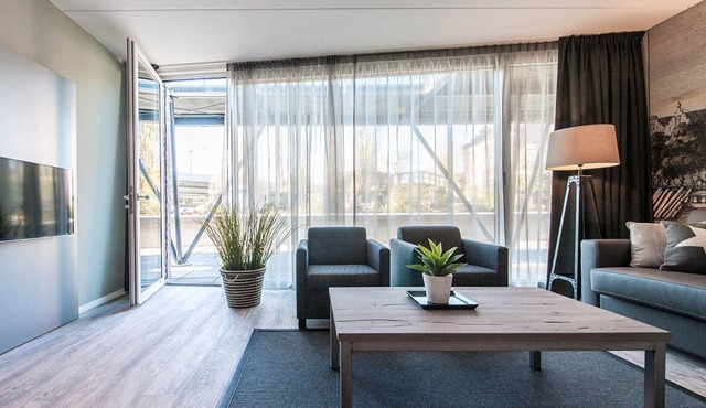 Bright and modern two bedroom apartment with canal view. Free Wi-Fi in Amsterdam