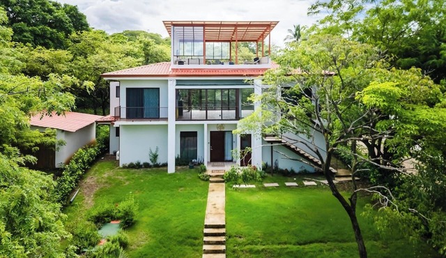 Casa Tuga is a bright 4BR, 4BA home with a private pool (with kid-friendly area), Just a short walk to the beach and restaurants. in Playa Junquillal