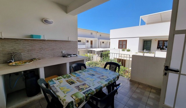 Cosy apartment for 5 guests with A/C, WIFI, TV and veranda in Punta Secca