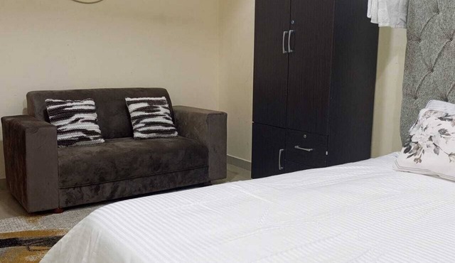 Escape to comfortn 2-bedroom apartment with WiFi, AC in fabulous Abu Dhabi