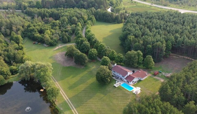 Exclusive 100-Acre Modern Estate Designed Home in Alton