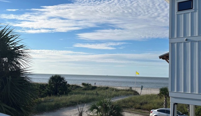 Fantastic Beach views, Great house & just steps until your feet are in the sand!