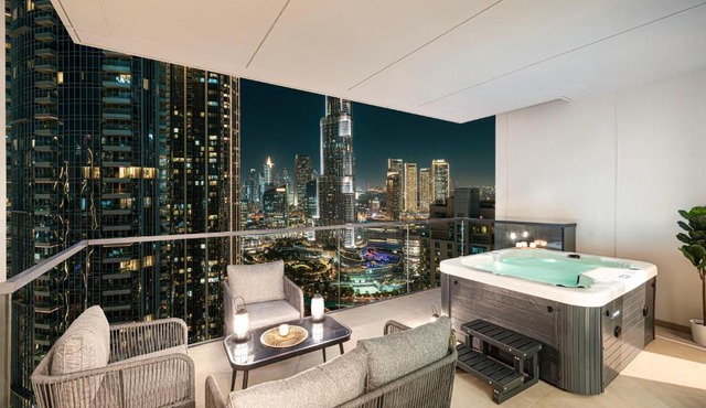 Luxury Downtown 3 Bedroom and Maid Room Apartment with amazing Burj View and Private Jacuzzi on a large Balcony