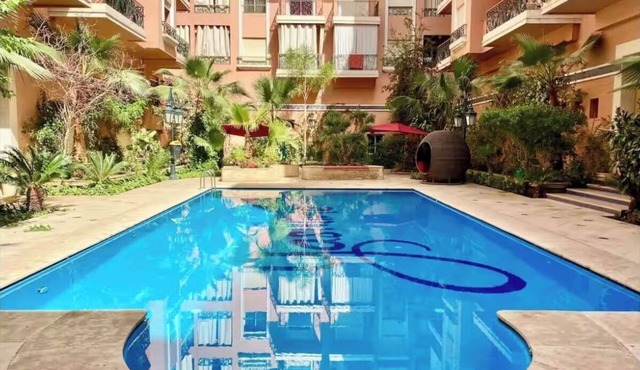 Modern 140 m² duplex - 2 bedrooms with terrace and shared swimming pool. Gueliz. in Marrakech