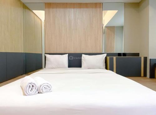 Modern Look Studio at Gateway Park LRT City Jatibening Apartment By Travelio