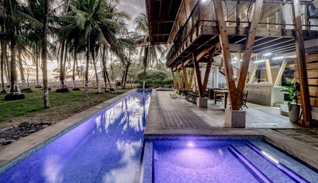 Open, dog-friendly, beachfront house with a private pool, pool spa, & WiFi in La Javilla
