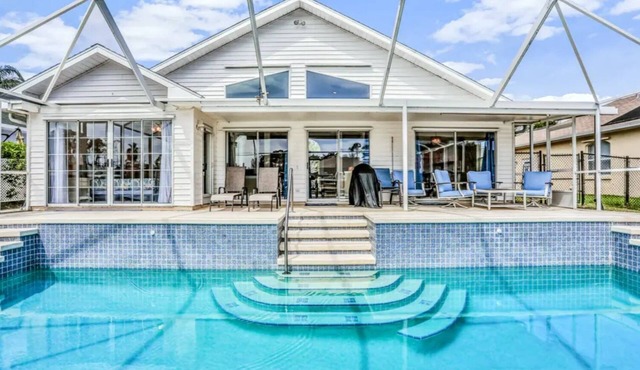 Peaceful Waterfront Pool Home by RedAwning in Palm Coast