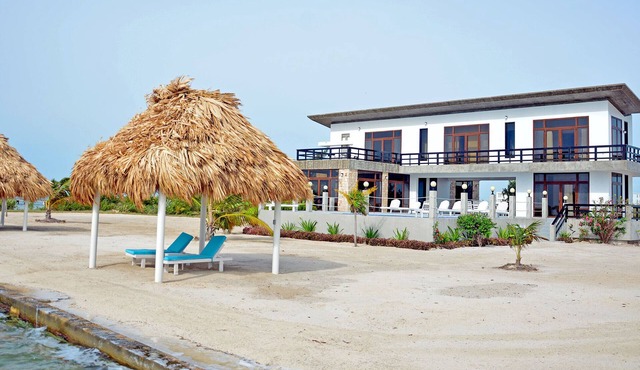 Seafront, 4 bedroom private villa, 10 guests, family vacation, activities nearby in Ambergris Caye