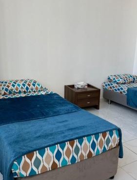 Single bed in al Majaz 2 - سوبر ديلوكس سرير مفرد في شقة فندقية