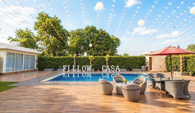 Spacious 5-bedroom farmhouse in tranquil Gurugram with AC