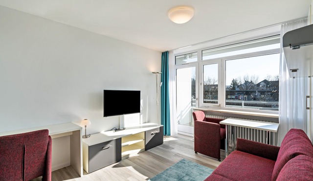 Studio Apartment "Huber Living Basic 203" with Balcony & Wi-Fi in Germering