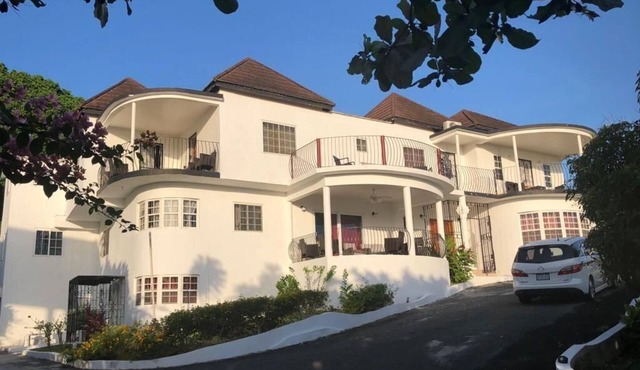 Upscale, Large country estate overlooking Spring Valley & the Caribbean Sea in Tower Isle