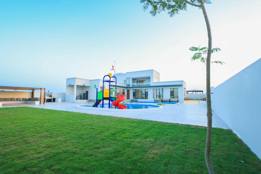 Musannah Resort | Al Tharaa Chalet استراحة الثراء