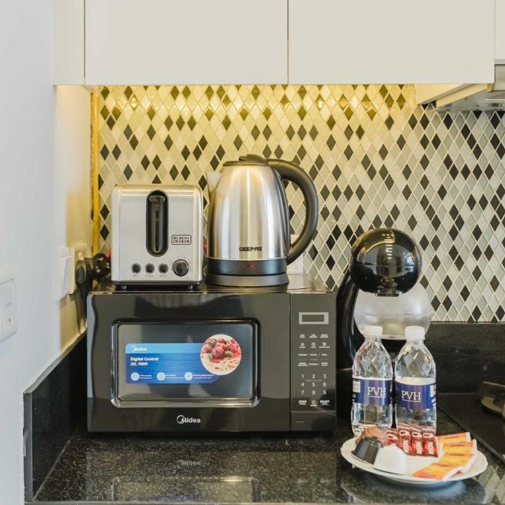 Sheikh Zayed Road Apartment | PVH - Aykon City - Charming Studio with Canal View