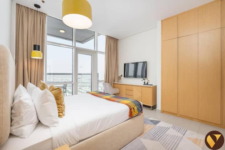 Jumeirah Village Triangle Apartment | Vogue Vacation Homes, Novotel Residences JVT near Springs Souk Mall, One Bedroom Apartment with Large Balcony and Vibrant Community view, Access to all Amenities