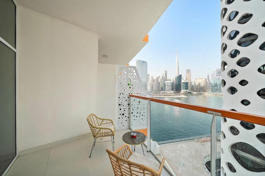 Business Bay Apartment | FIRST CLASS Studio Canal & Burj Khalifa View