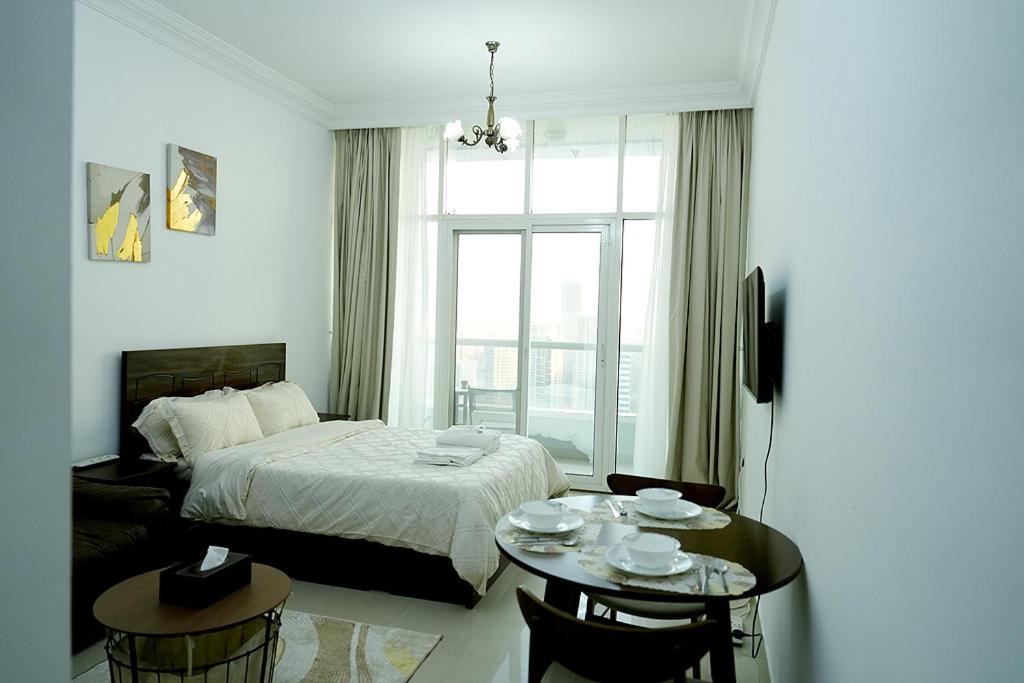 Sharjah Apartment | Cozy Private Studio -Near Beach -City View -Downtown Sharjah - Pool & Gym