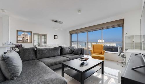 Three-Bedroom Premium Apartment with Balcony