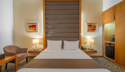 Deluxe Room with One King Bed Balcony - 20% off Food & Beverages, Late Check-out until 4pm + Early Check-in from 8am , 50% Off on Spa Services, 50% Off Laundry Services