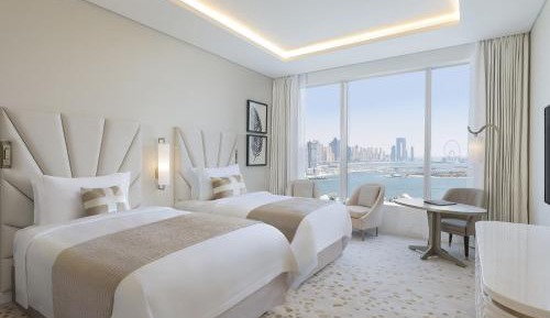 Grand Deluxe Twin Room with Partial Sea View, KYMA beach access, Signature St. Regis Butler Service
