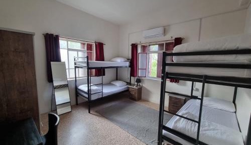 Economy Quadruple Room with Shared Bathroom