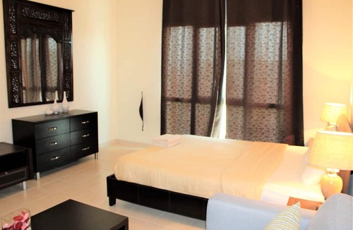 Discovery Gardens Apartment | KSLV - Furnished Studio