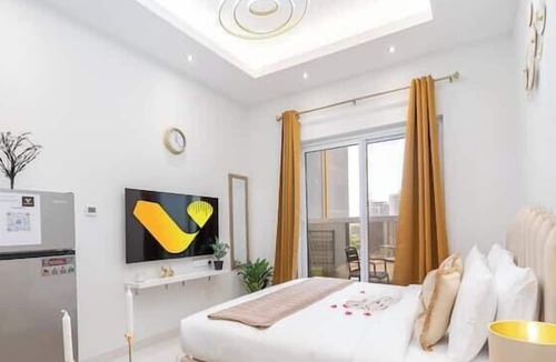 Dubai Sports City Apartment | Vogue | Hera Tower Sports City near First Avenue Mall