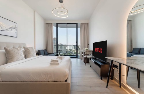 Al Barsha Apartment | Chic Studio Cinema & Game Room in Arjan