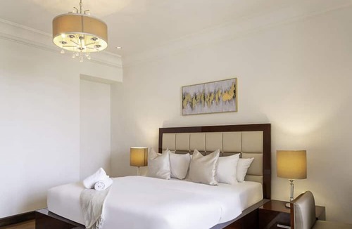 Palm Jumeirah Apartment | LUX The Grandeur Palm Garden View Suite