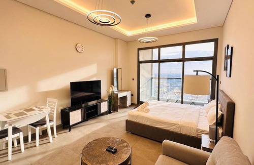 Business Bay Apartment | Upscale Apartment at Oval Tower Near Downtown with Balcony and Parking by Belvilla