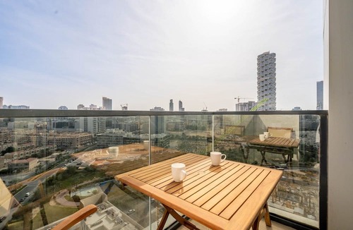 Jumeirah Village Circle Apartment | GuestReady - Arabic Charm | Balcony | Regina Tower
