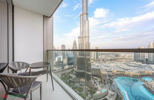 Downtown Dubai Apartment | SML Vacation Homes - Sky High Apartments with Burj Khalifa and Dubai Fountain Views @ Grande Signature, Downtown Dubai