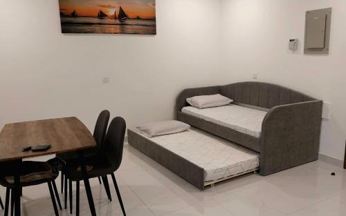 Al Ghubrah Ash Shamaliyyah Apartment | Beach star residency 2