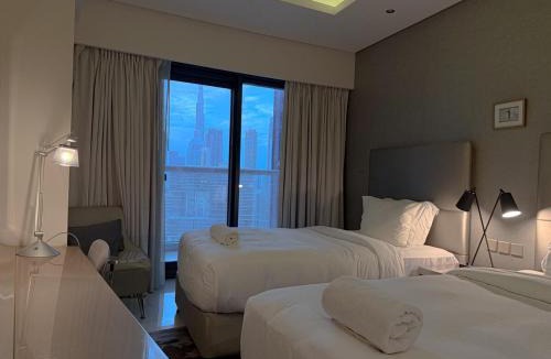 Business Bay Apartment | Cozy 2BR in Paramount Dubai with Burj Khalifa View