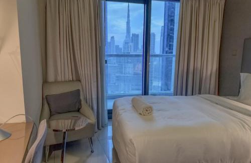 Business Bay Apartment | Cozy 2BR in Paramount Dubai with Burj Khalifa View