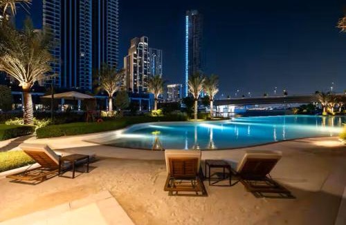 Madinat Zayed Apartment | Vogue Vacation Homes, Creek Beach Rosewater Waterfront Living close to Downtown, Burj Khalifa and Dubai mall, Two Bedroom Apartment with Balcony and Vibrant Community View, Private Manmade Beach, Access to all Amenities