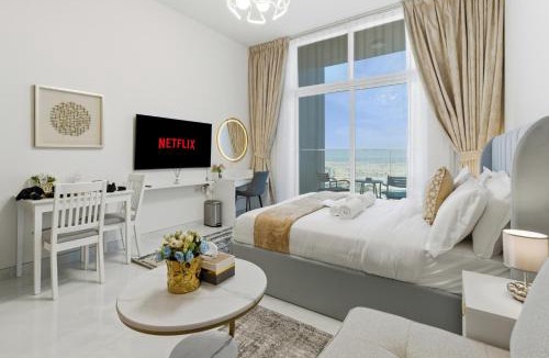 Al Barsha Apartment | Modern Studio on 27th Floor with Miracle Garden Views