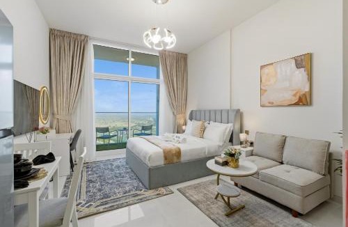 Al Barsha Apartment | Modern Studio on 27th Floor with Miracle Garden Views