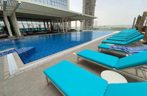 Jumeirah Village Triangle Apartment | Vogue Vacation Homes, Novotel Residences JVT near Springs Souk Mall, One Bedroom Apartment with Large Balcony and Vibrant Community view, Access to all Amenities
