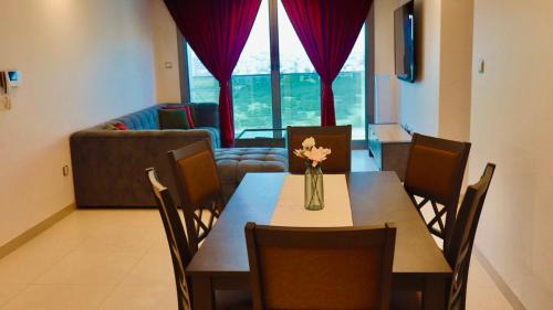 Al Ghubrah Ash Shamaliyyah Apartment | Modern 2BR Oasis - Balcony With Sea View