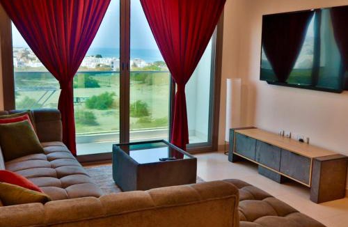 Al Ghubrah Ash Shamaliyyah Apartment | Modern 2BR Oasis - Balcony With Sea View