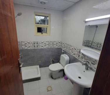 Madinat Zayed Apartment | Master bedroom Altaawun Street