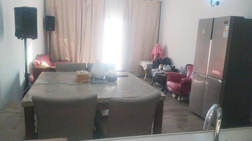 International City Apartment | One Private Bedroom and Living Room