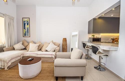 Al Hamra Village Apartment | Serene Lagoon Escape