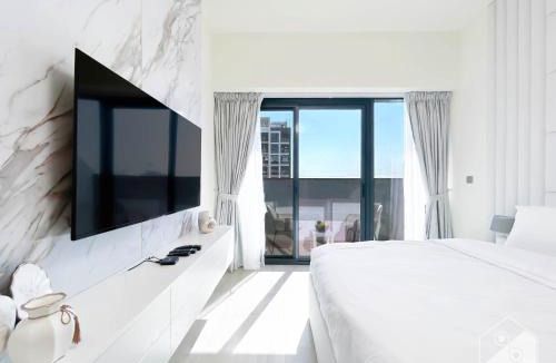 Nad Al Sheba Apartment | Luxury Living in Azizi Riviera l Cozy Balcony