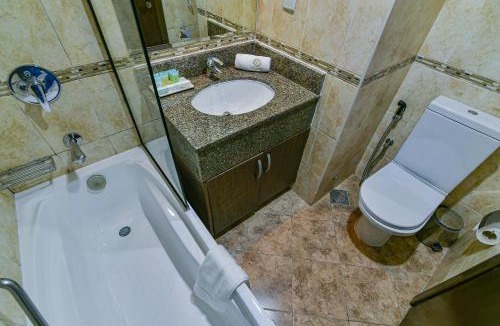 Al Muraqqabat Hotel | VISTA HOTEL APARTMENTS DELUXE