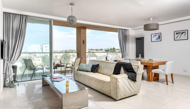 Modern Gem with Stunning Balcony by Sea N Rent