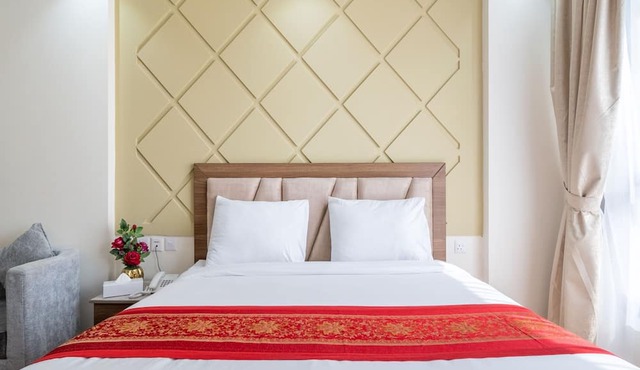 OYO Townhouse 156 Rose Hotel Apartments.