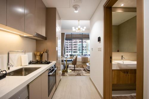 Riviera Living, Redefined - Stylish Studio with Pool and Balcony